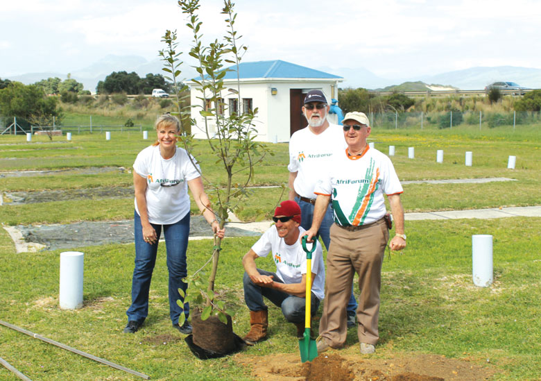 IN THE SPRING OF THINGS AfriForum Overstrand chair Elmarie van Dalen, Kleinmond councillor Grant Cohen, and AfriForum’s Anton Kruger, Chris Harding and Willem Groenewald digging in.
